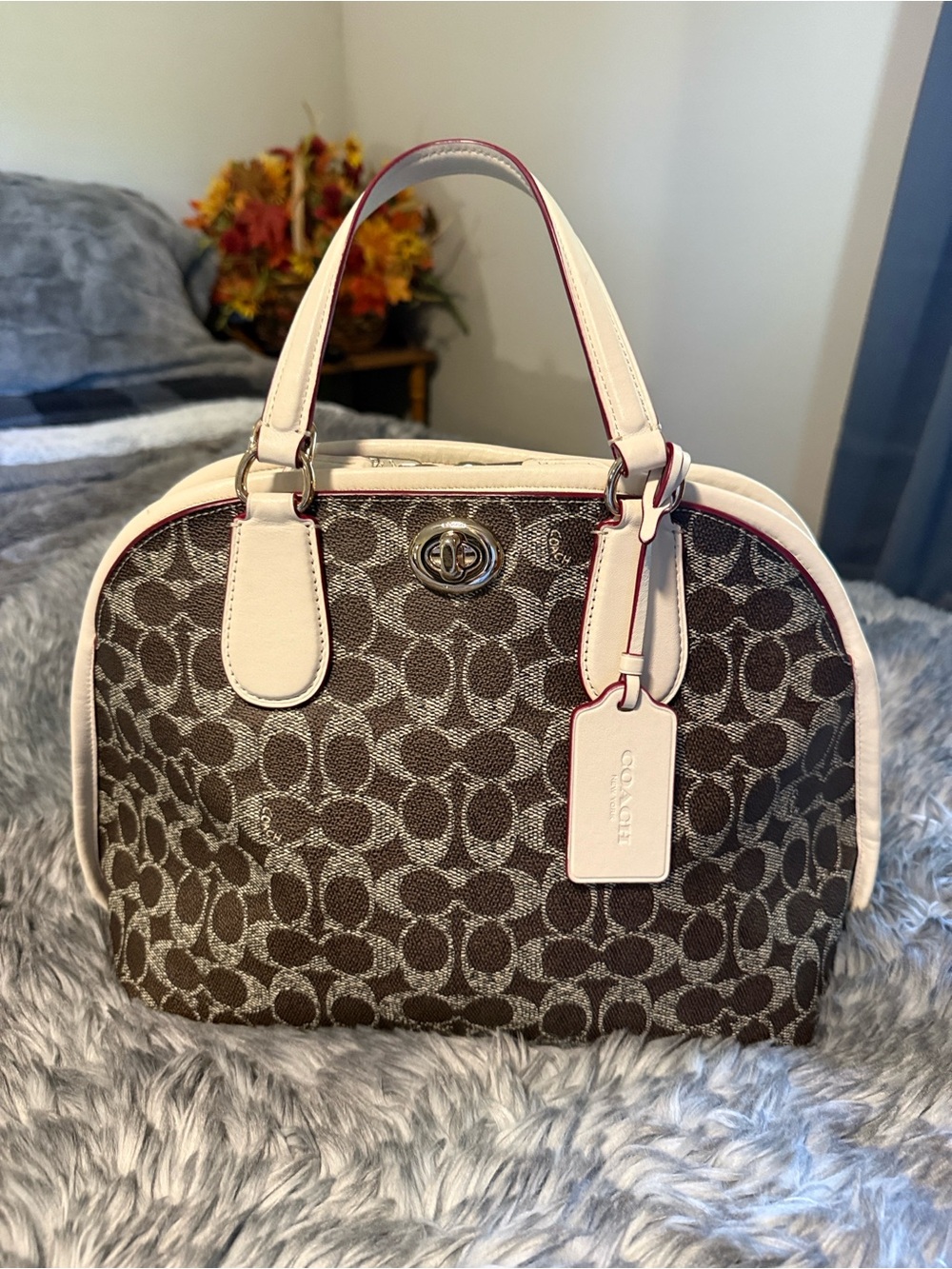 Discontinued-Coach Satchel Brown
& White Leather Trim Gold
Hardware